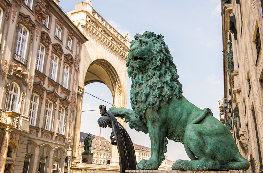 Bavarian lion statue at Munich Alte Residenz palace in Odeonplatz. Munich, Bavaria, Germany. Munich is the capital and largest city of the German state of Bavaria