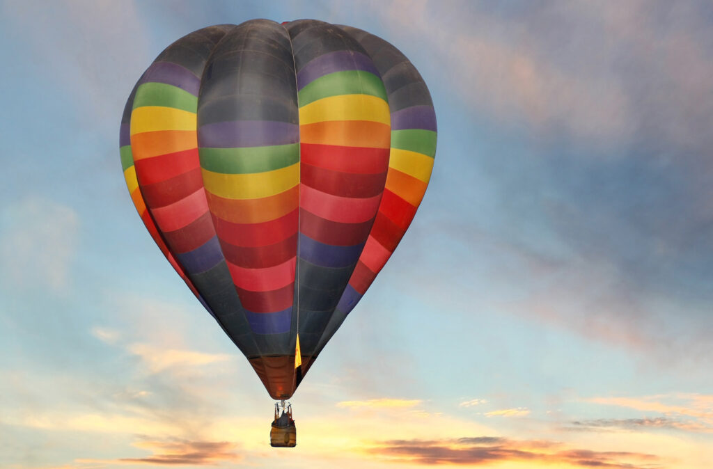 colorful hot air balloon in a sunrise sky