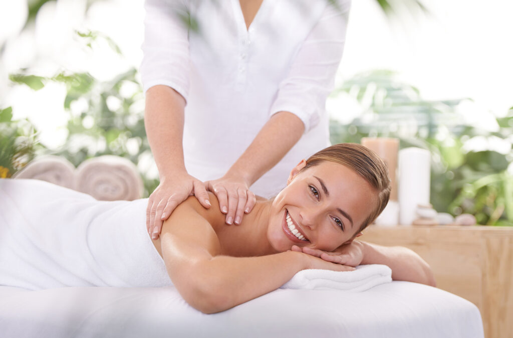 An attractive young woman having a massage at the spa