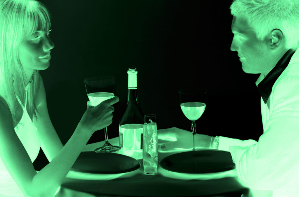 Young beautiful couple having a dinner in a restaurant