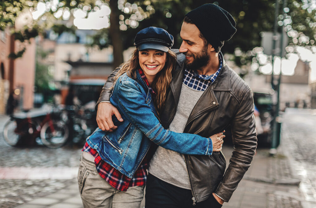 Close up of a happy young couple enjoying city life.