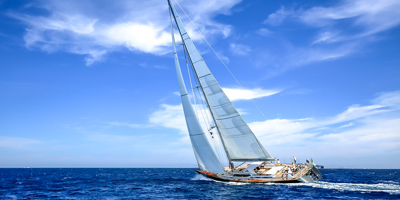 PORTO CERVO, SARDINIA, ITALY - JULY 01, 2015: BEAUTIFUL Yacht at full spead, training for boat race (team unidentified)