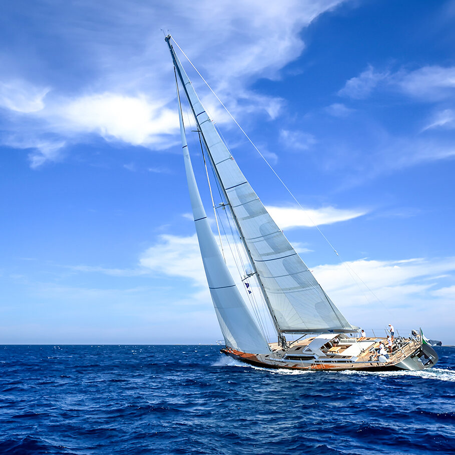 PORTO CERVO, SARDINIA, ITALY - JULY 01, 2015: BEAUTIFUL Yacht at full spead, training for boat race (team unidentified)