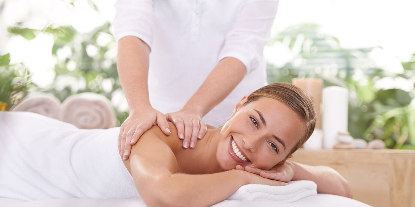 An attractive young woman having a massage at the spa