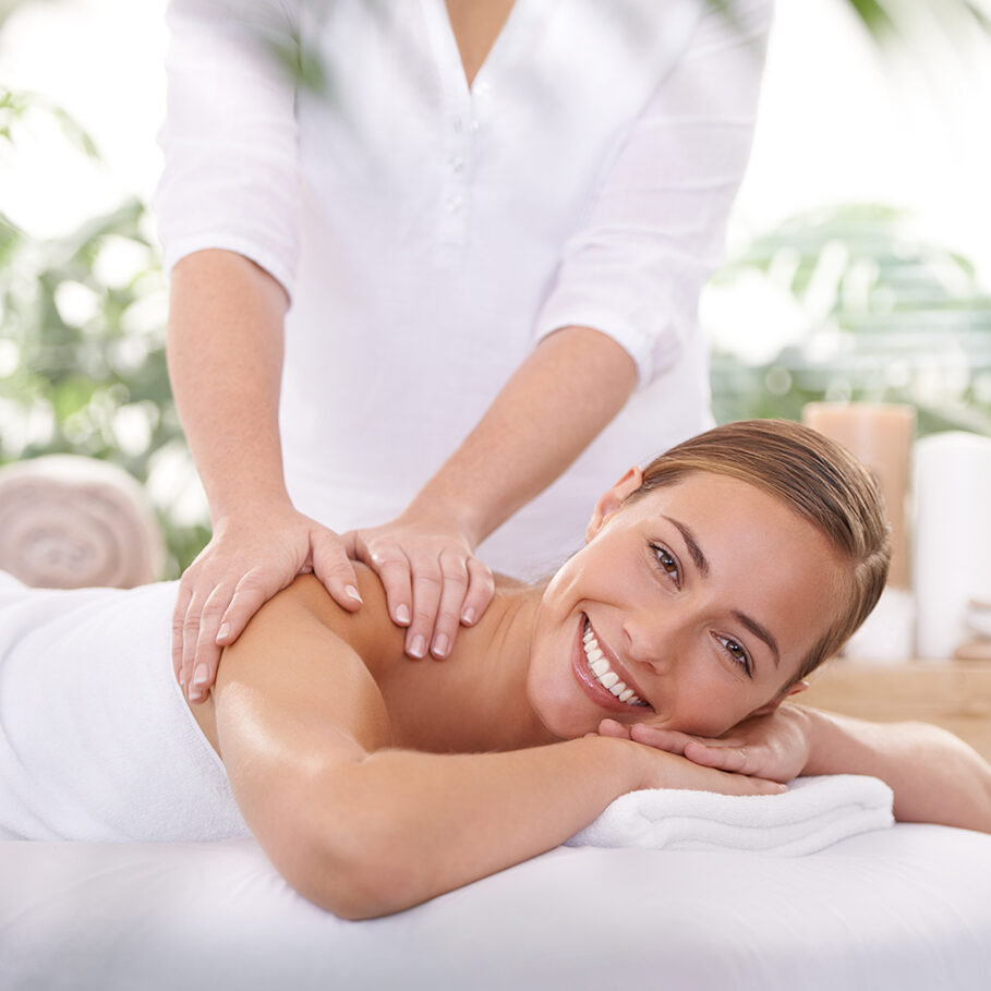 An attractive young woman having a massage at the spa