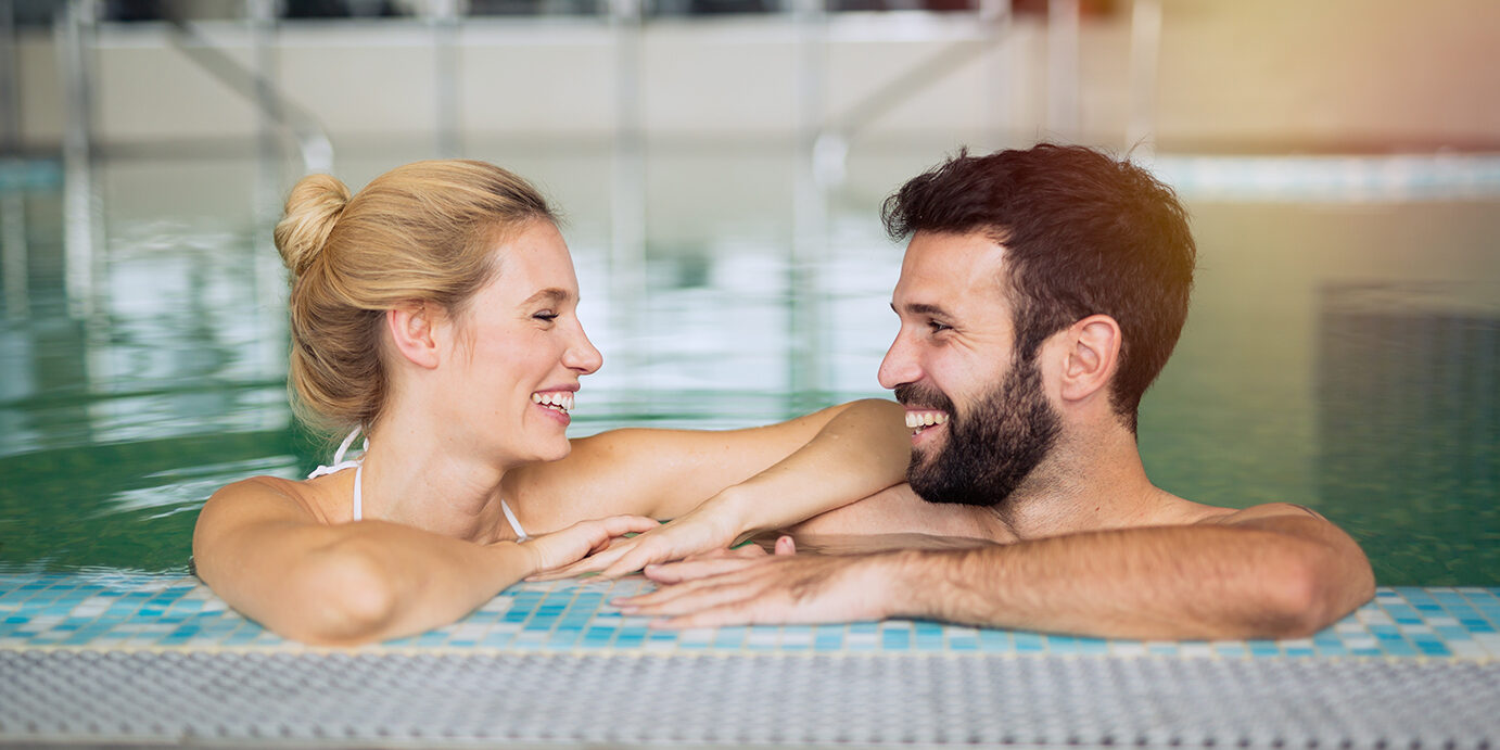 Beautiful couple enjoying spa wellness weekend