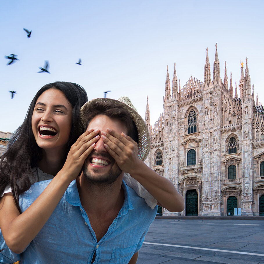 Galleeria Vittorio Emenuele and Milan Cathedral square with flying pegion in the morning