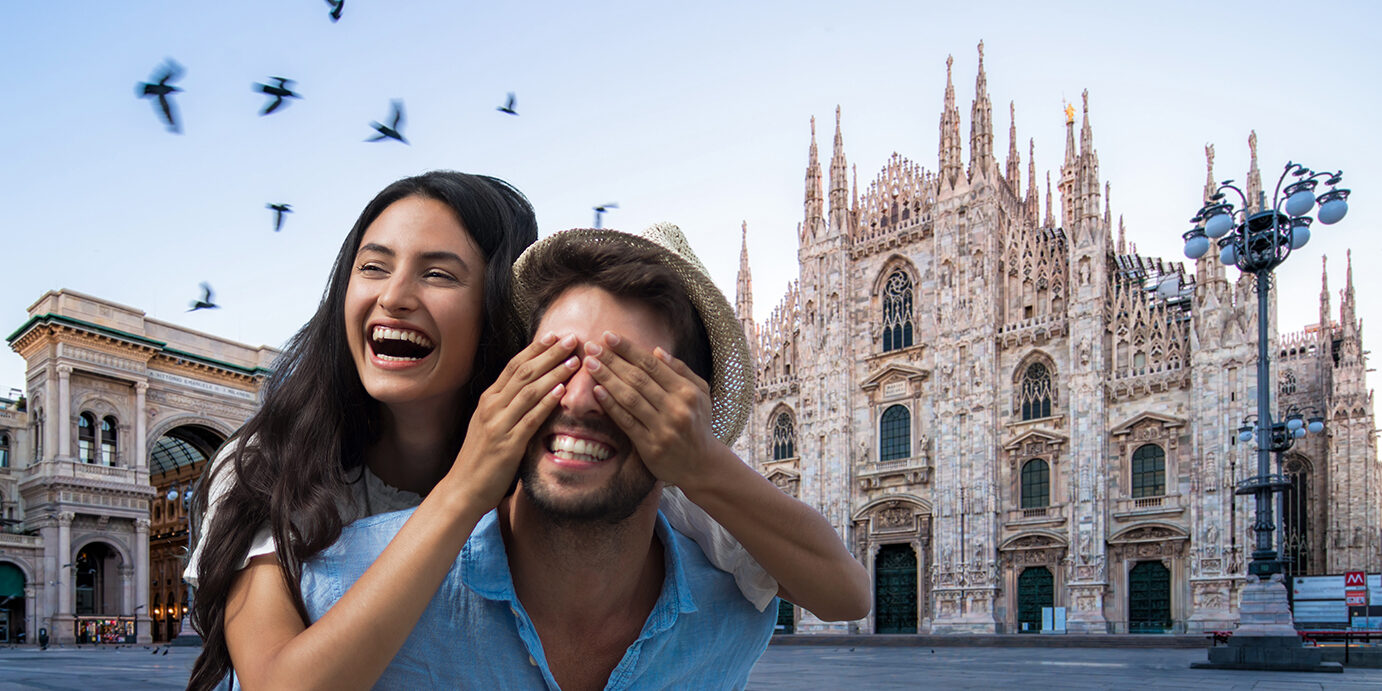 Galleeria Vittorio Emenuele and Milan Cathedral square with flying pegion in the morning