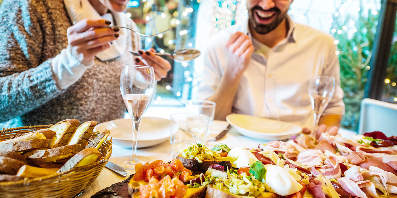 Couple having Christmas dinner in a restaurant