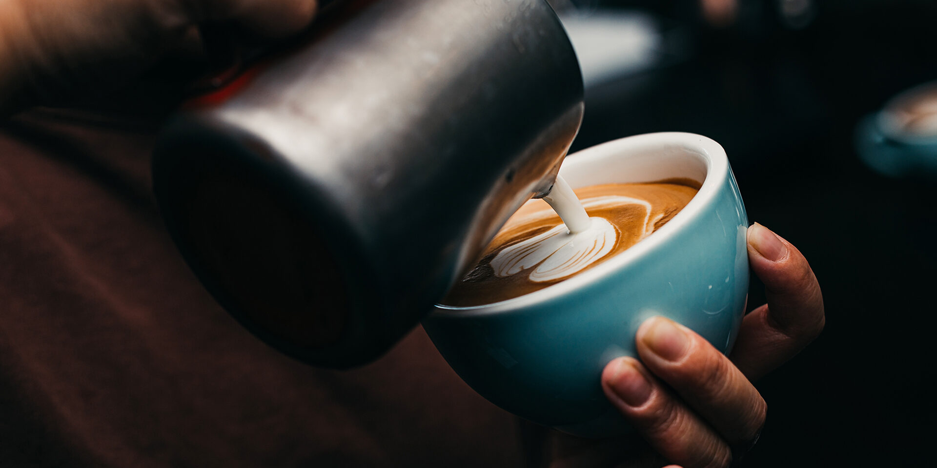 Barista Pouring Latte Art Photography