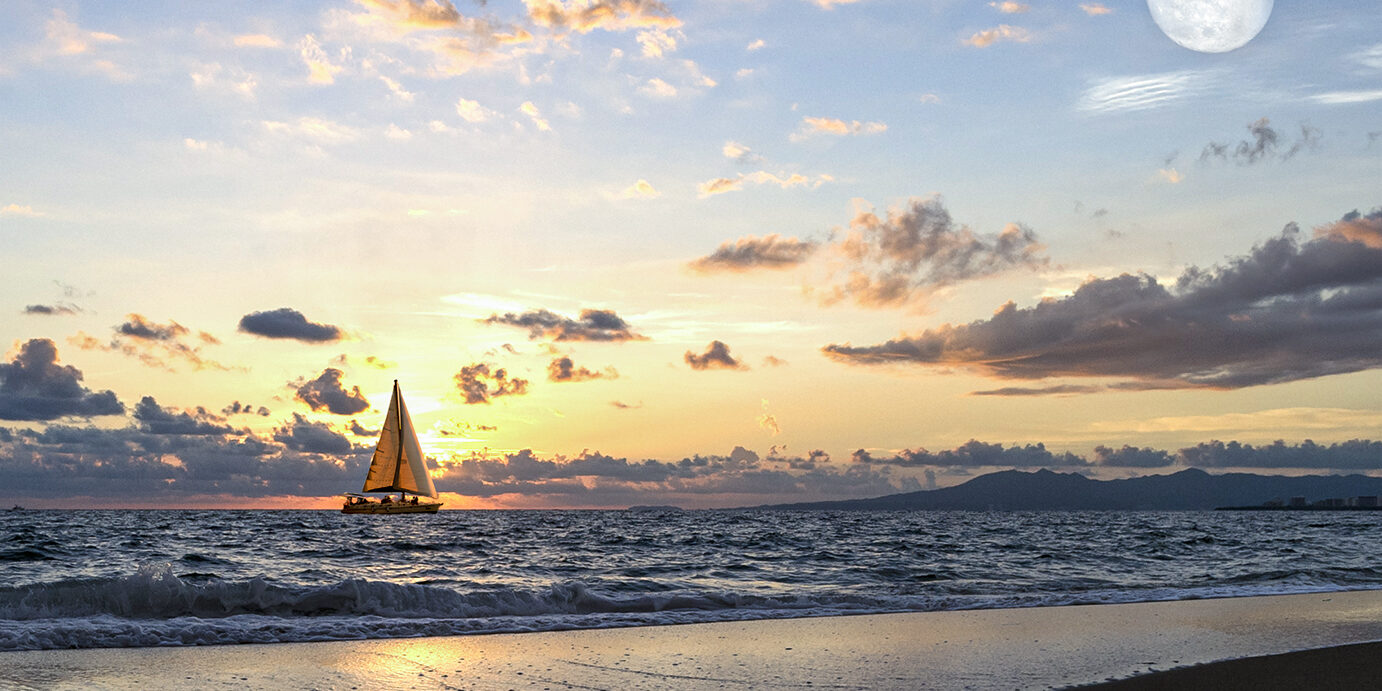 Ocean Sunset Ocean sunset is a fantasy like setting with a backlit sailboat moving along the water as the sun sets and the moon rises in the background.