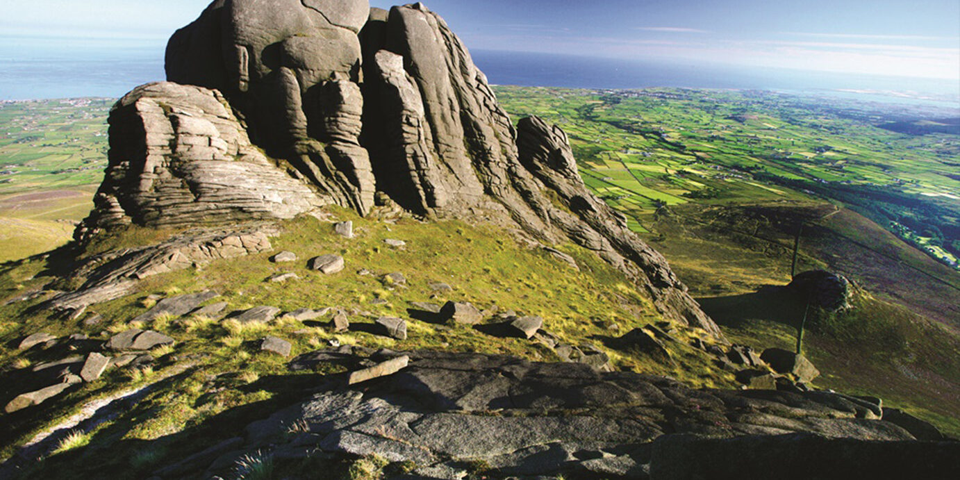 The Mourne Mountains or Mournes, a granite mountain range located in County Down in the south-east of Northern Ireland, are among the most famous of the mountains on the island of Ireland. The surrounding area is an Area of Outstanding Natural Beauty and is proposed as the first National Park in Northern Ireland. The Mountains of Mourne are partly owned by the National Trust and see a large number of visitors every year. The highest mountain is Slieve Donard at 849 metres (2,786 ft).