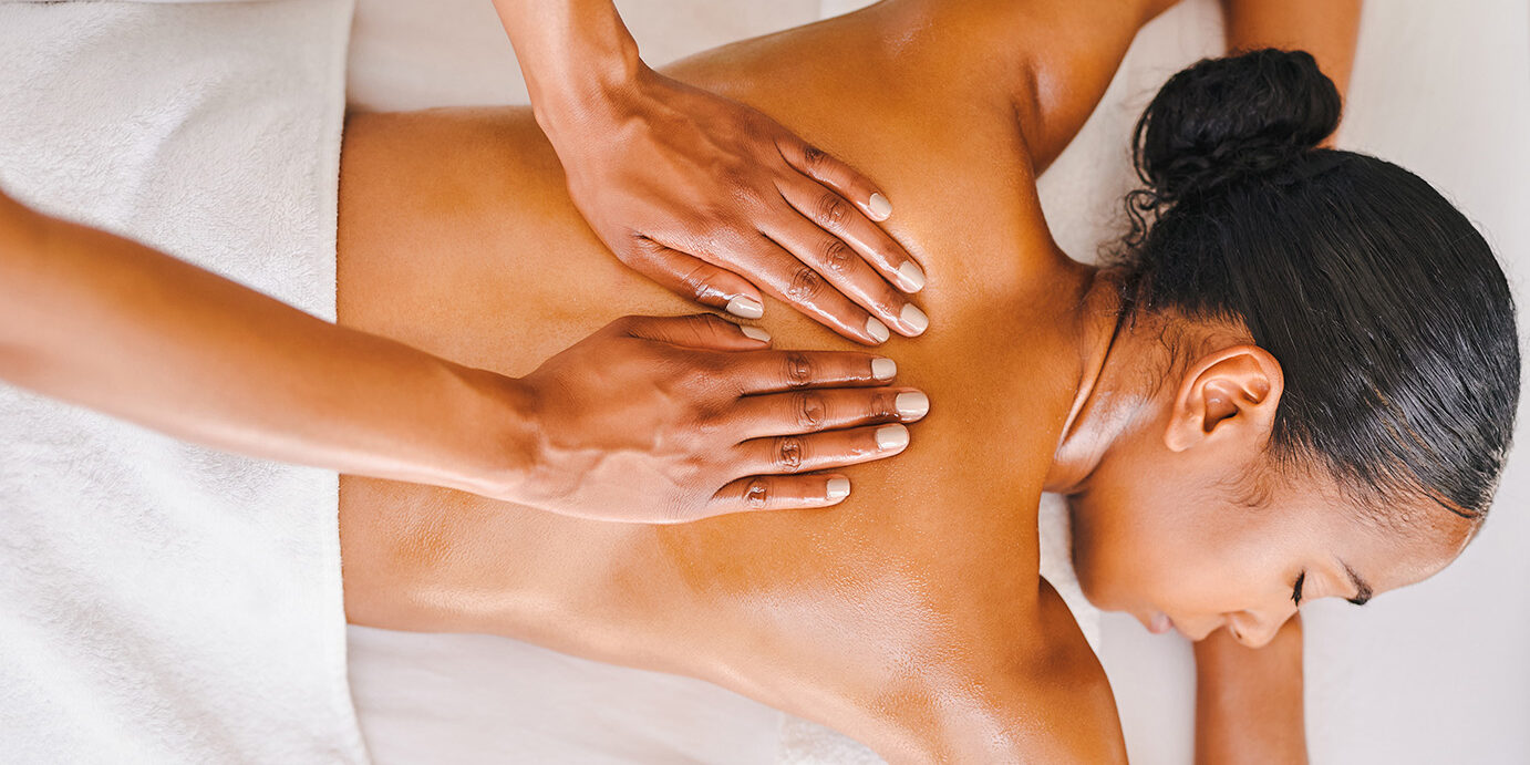 Shot of an attractive young woman getting a massage at a spa Get back to zen again