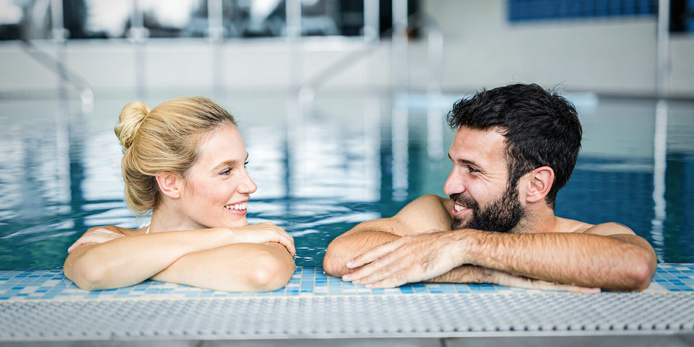 Picture of happy couple relaxing in spa pool