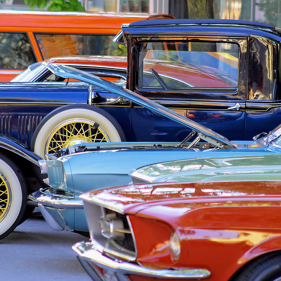 Classic cars parked along street