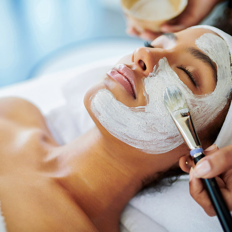 Shot of an attractive young woman getting a facial at a beauty spa