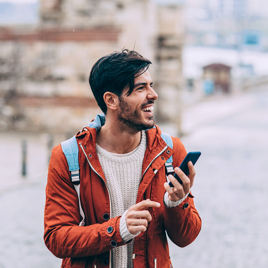 Tourist searching for information on the internet.