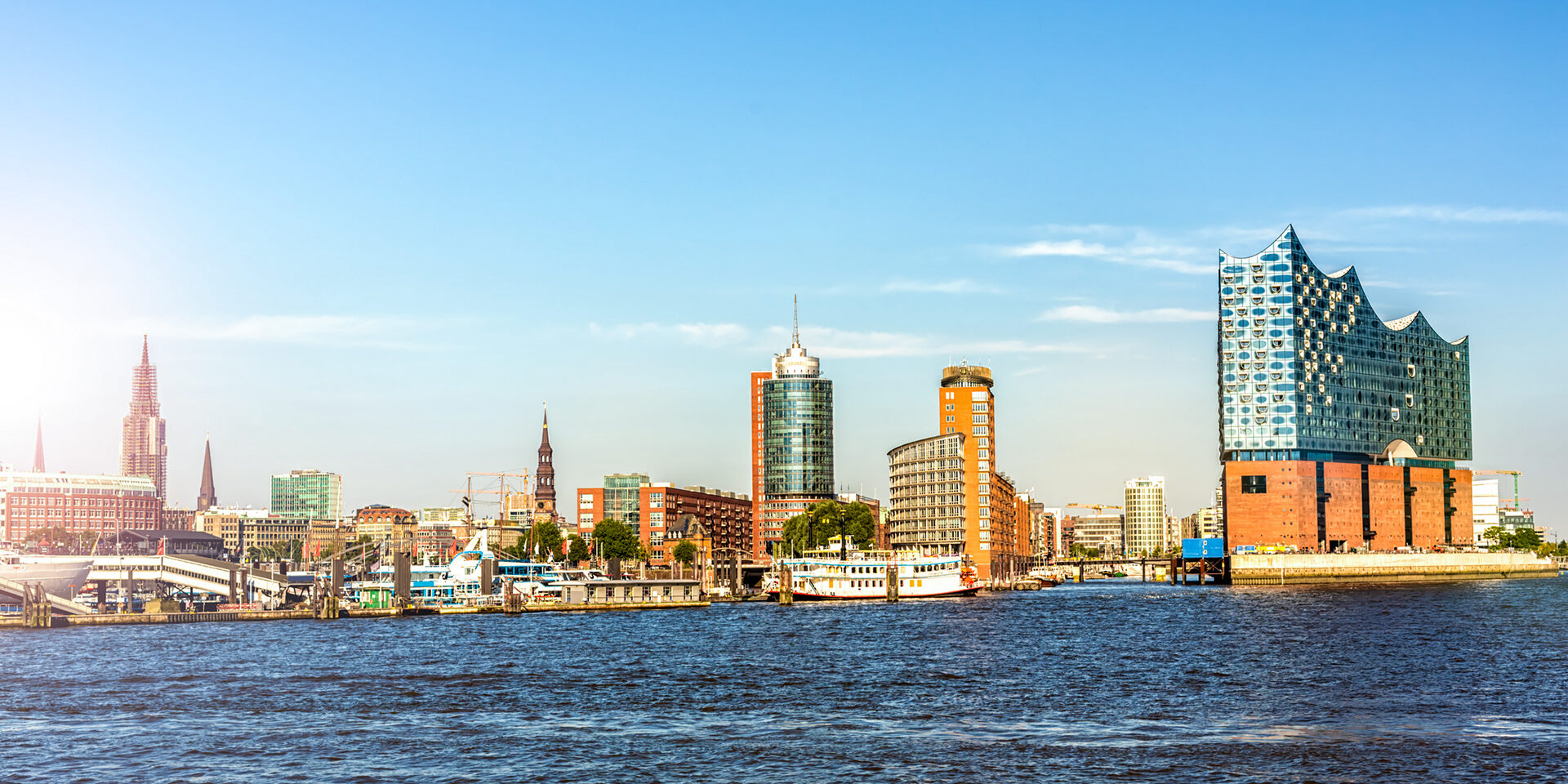 Hamburg skyline with Landungsbrücken and Elbphilharmonie Hamburg skyline with Landungsbrücken and Elbphilharmonie