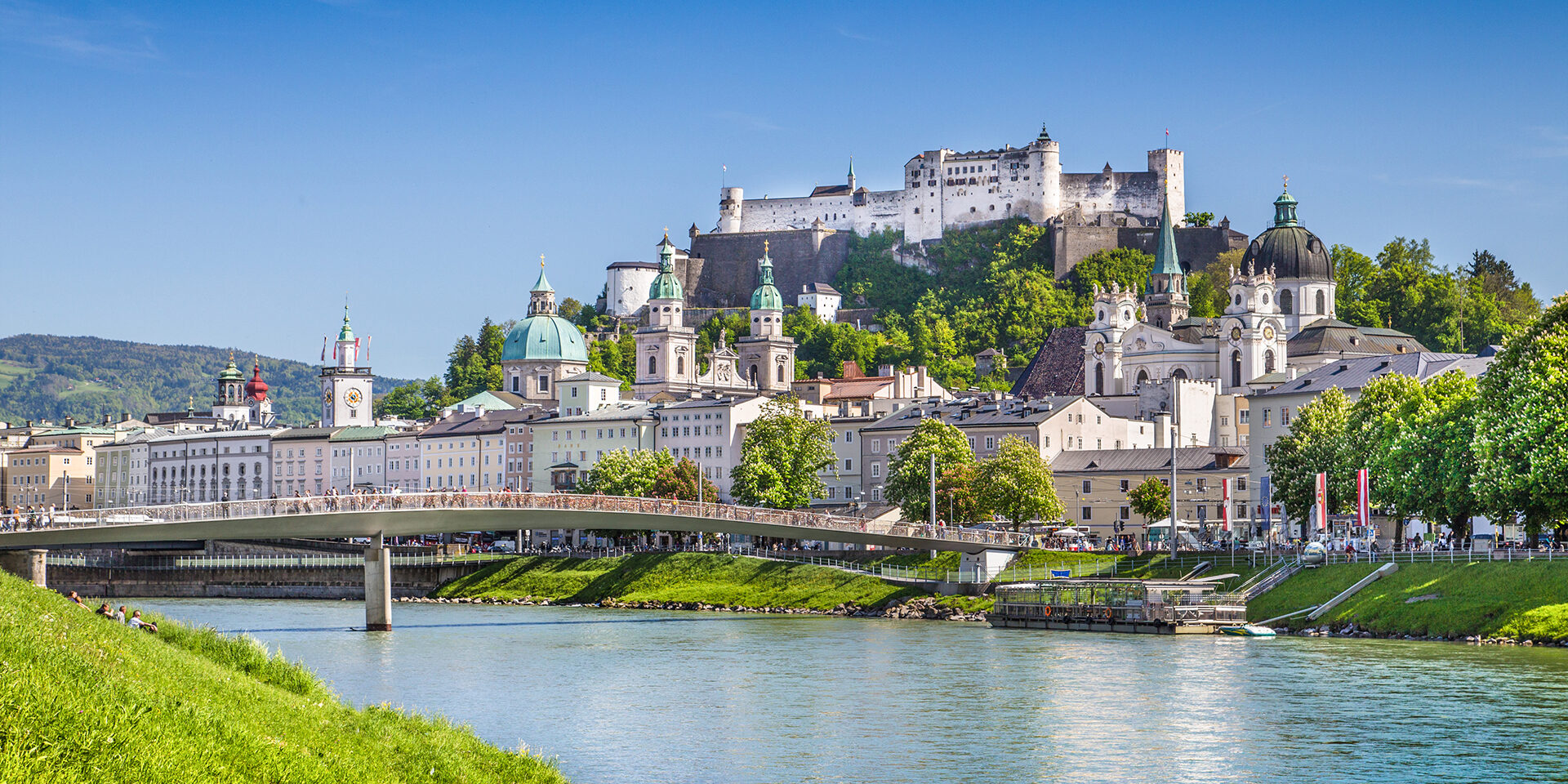 Beautiful view of Salzburg skyline with Festung Hohensalzburg and Salzach river in summer, Salzburg, Salzburger Land, Austria