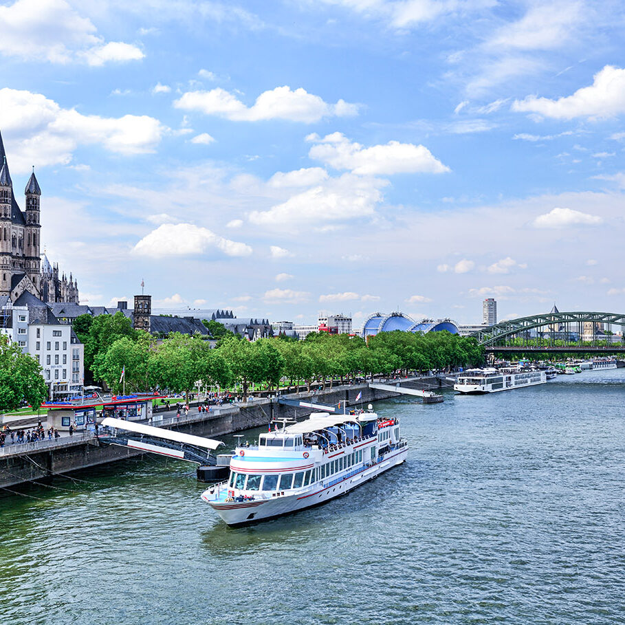 Promenade and Rhine River in Cologne, Germany. Composite photo