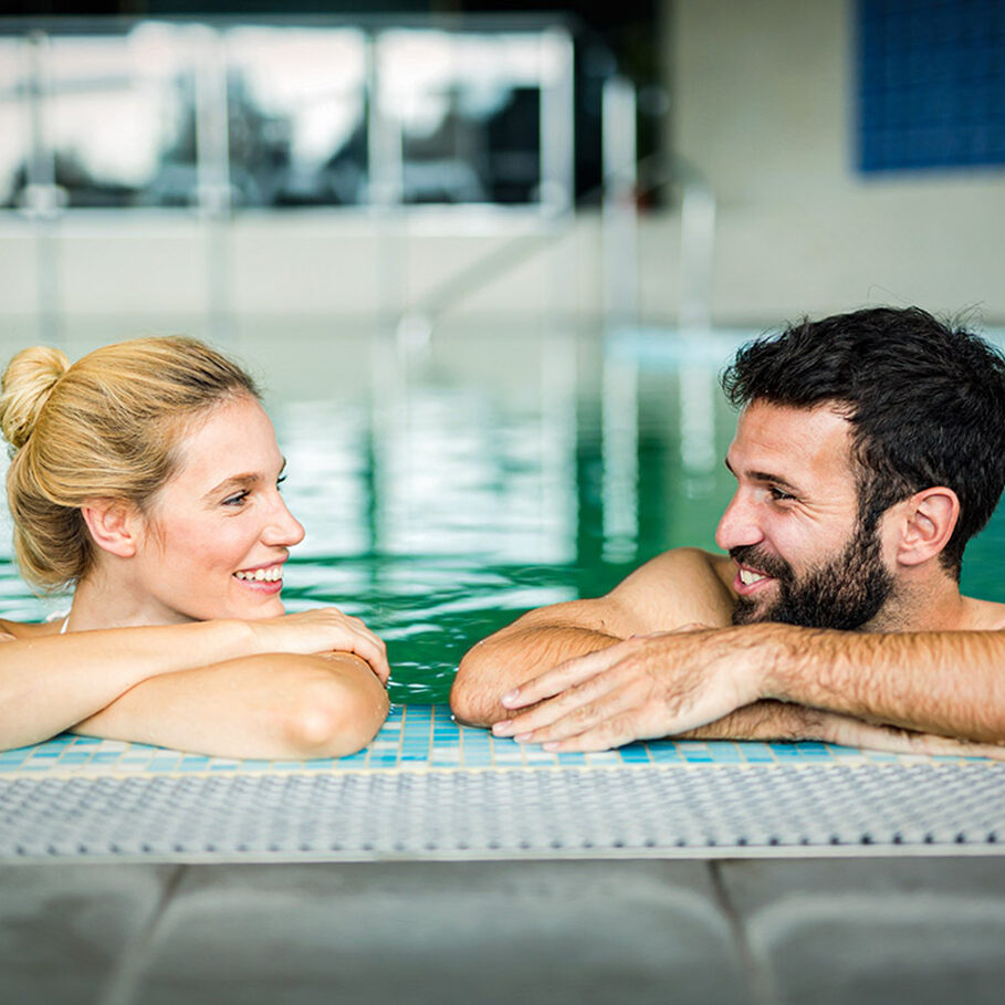 Picture of happy couple relaxing in spa pool