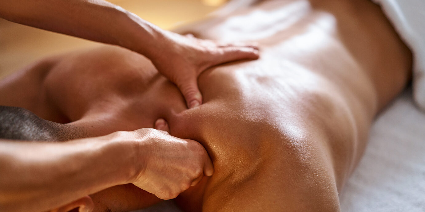 Close-up of a man getting massage Close-up of a man getting massage
