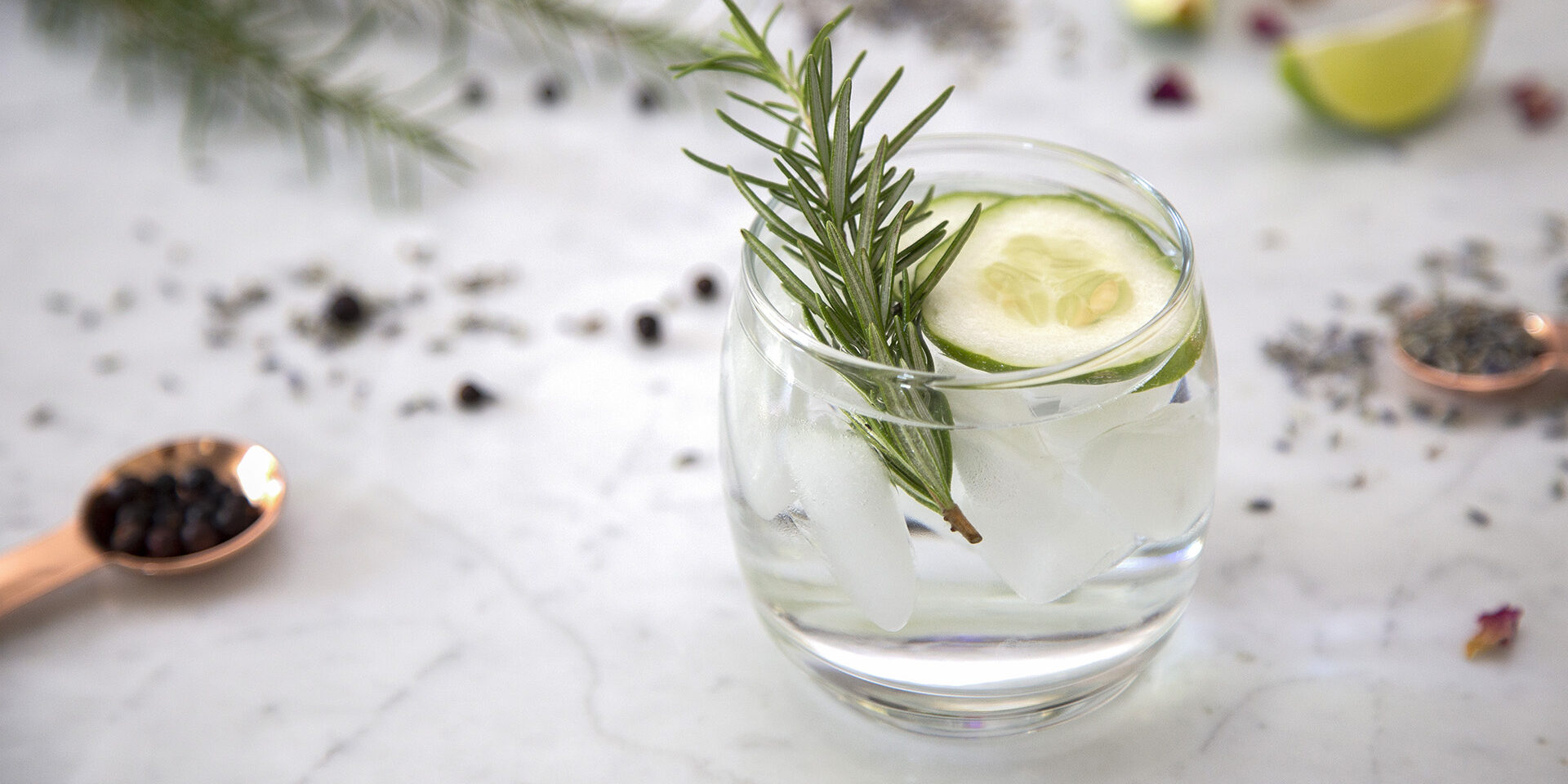 Gin Cocktail with garnish Cocktails on marble table top with spices