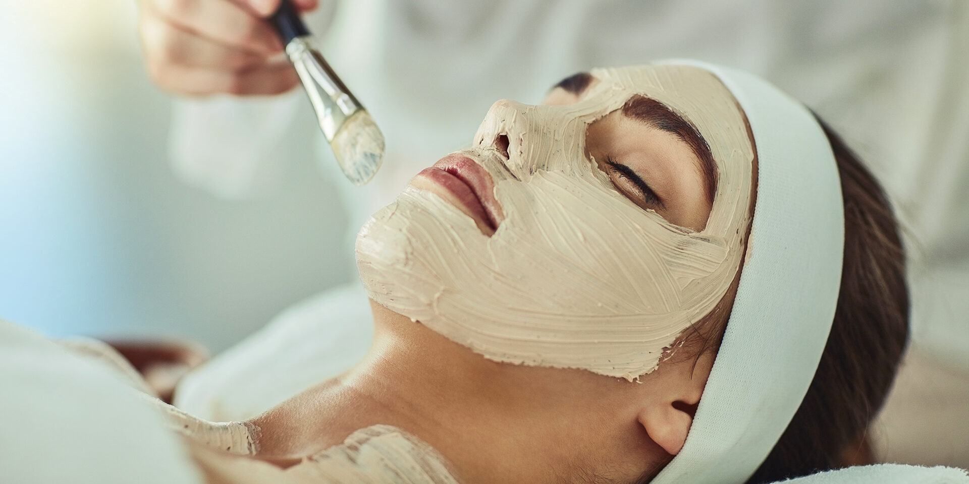 Give your skin the boost it deserves Shot of an attractive young woman getting a facial at a beauty spa