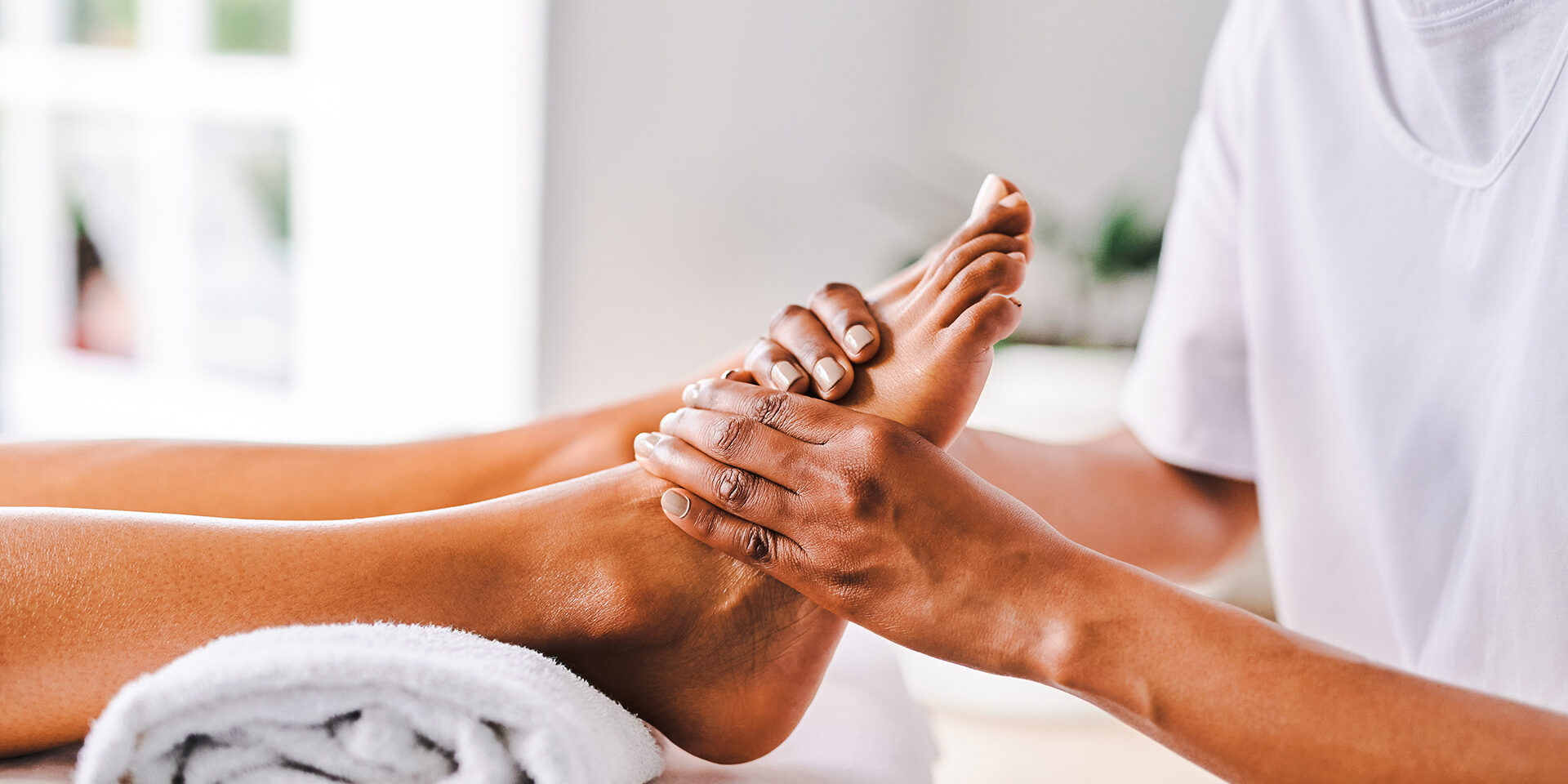 Shot of an unrecognisable young woman getting getting massaged at a beauty spa The best foot rub by far