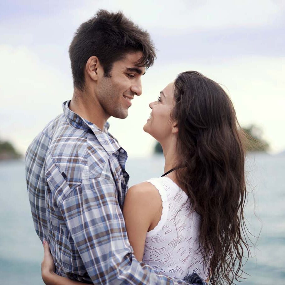 Shot of an affectionate young couple enjoying a vacation by the sea