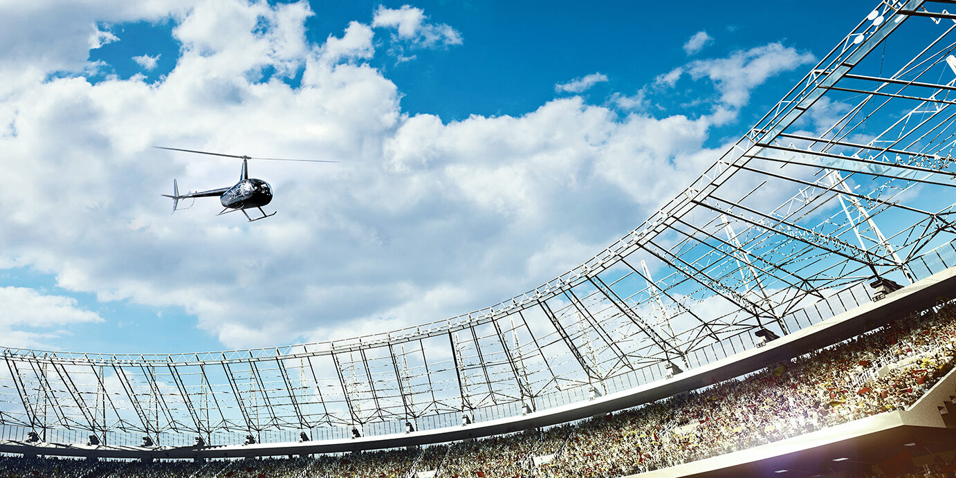 crowded stadium with blue cloudy sky crowded soccer stadium on blue cloudy sky background