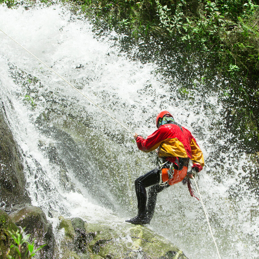 Waterfall descent by a professional canyoning istructor.