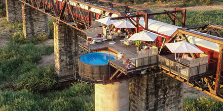 medium_8a0092ff90b981d10190bbc430217e79-Suedafrika-Limpopo-Provinz-Phalaborwa-Kruger-Shalati-The-Train-on-the-Bridge